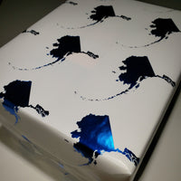 A close up of the foil on our State of Alaska wrapping paper.