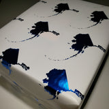 A close up of the foil on our State of Alaska wrapping paper.