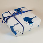 State of Alaska wrapping paper comes with 3 sheets per roll.  Each sheet is 19.5" x 27.5" (50x70cm) or 11.25 square feet.  Glossy white background with the state of Alaska stamped with a beautiful dark blue foil.